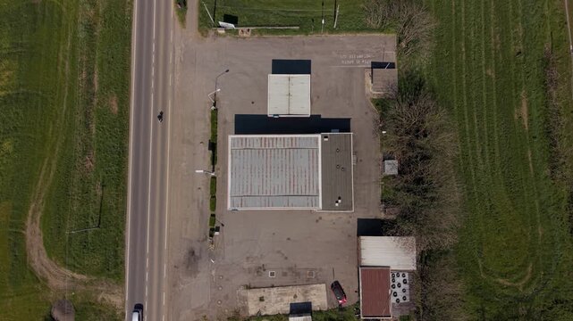 Drone view of a gas station in rural Italy.