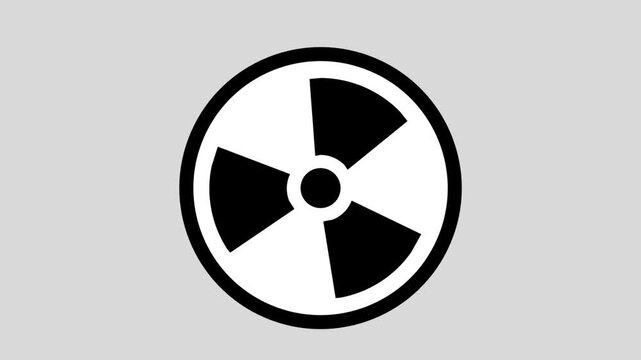 This image shows a bold black radiation warning symbol centered on a light gray background. The circular design features three triangular blades radiating from a central point, indicating the presence