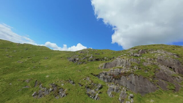 An FPV drone threads its way along the towering concrete face of the Cruachan Reservoir dam above Loch Awe, racing past steep green slopes and still mountain waters&mdash;delivering a dynamic, immersive aer