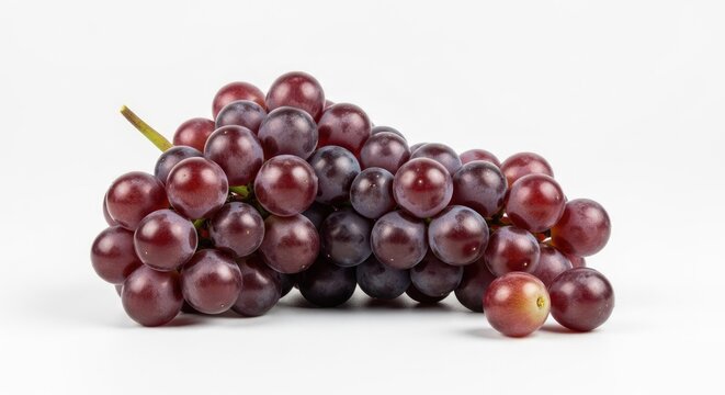 Fresh red grapes cluster on white background for healthy food concepts