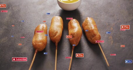 Showing four fried skewered snacks on dark slate, wooden sticks, white bowl yellow sauce, UI badges © vectorfusionart