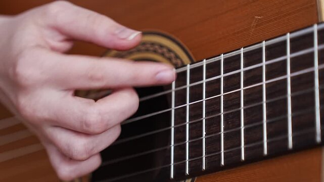 Learning basic guitar techniques step by step