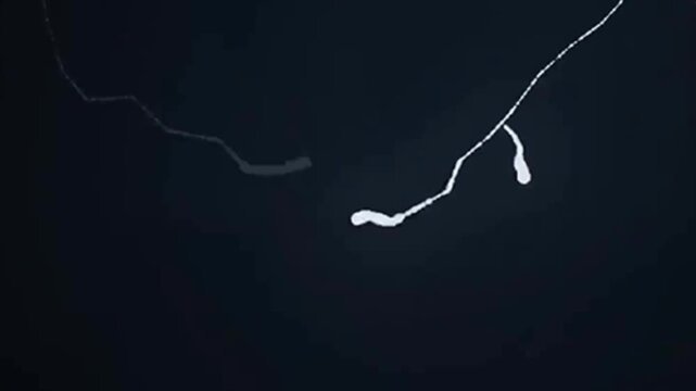 Abstract motion background footage of randomly blinking flashes and Sparkling and flickering light particle effect, decorative footage to enhance text and logo animations.