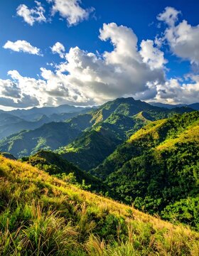 A vibrant mountain range bathed in sunlight, with rolling green hills and a dramatic sky filled with fluffy clouds