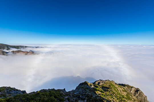 Rainbow above clouds at Pico do Areeiro viewpoint Madeira Portugal