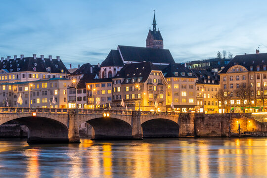 Evening cityscape of Basel old town and Martinskirche by the Rhine