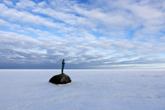 Sculpture Kaysa on rock in frozen Baltic Sea at R�gen Baabe in winter