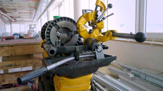 Yellow Metal Pipe Threading Machine