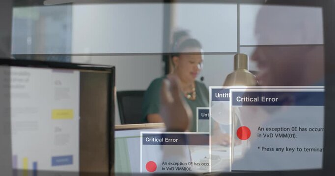 African American coworkers fixing critical error dialogs at office as woman typing with headset