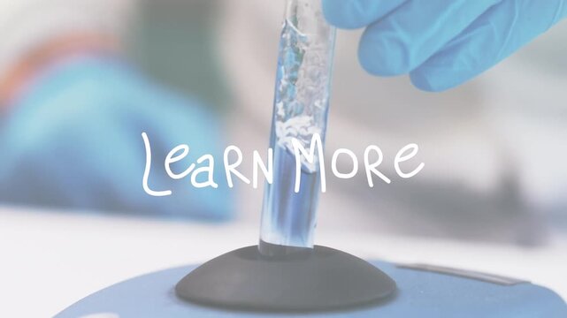 Animation of learn more text over scientist in lab