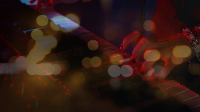 Animation of blurred night road traffic over hands of caucasian man playing keyboard on concert