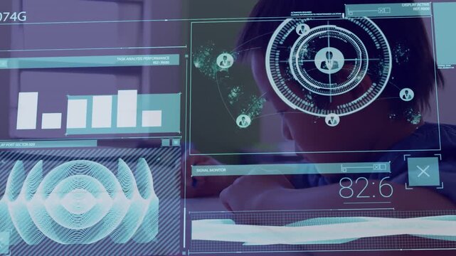 A schoolboy studying at his desk in a classroom