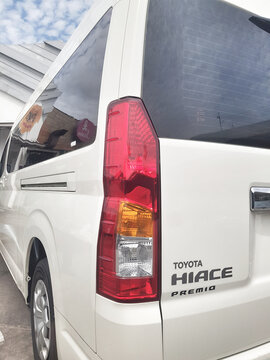 Jakarta, Indonesia on 1 Nov 2025. White Toyota Hiace Premium Van Parked Near Building