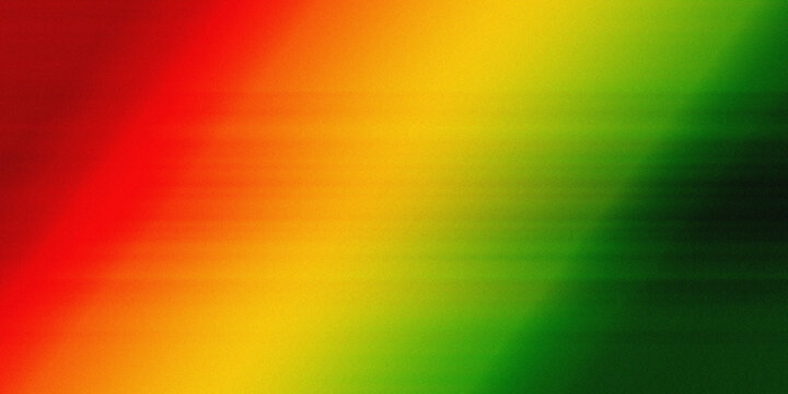 Abstract background in red, yellow and green tones with grainy texture. Juneteenth Freedom Day