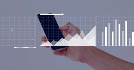 Fototapeta premium Holding bare forearm and hand presenting charts on smartphone in light-gray studio, with overlays