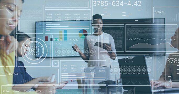 Presenting standing woman in white dress holding tablet, gesturing at wall charts with HUD graphics