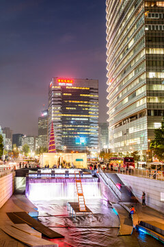 Cheonggyecheon stream and illuminated skyscrapers in Seoul at night