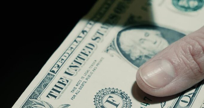 Female hands counting money hundred dollar bills