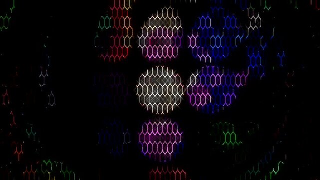 Symmetrical kaleidoscope motif with blue diamond shapes forming a glowing geometric pattern on a black background.	