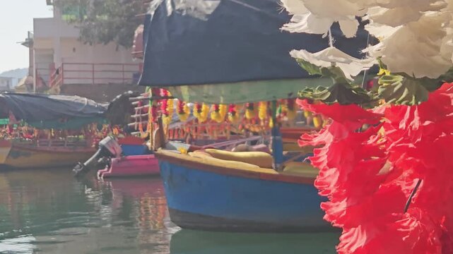 Scenic view from a moving boat at Ram Ghat in Chitrakoot, Madhya Pradesh, on the sacred Mandakini River. This spiritual riverside location is associated with Lord Rama, Sita, and Lakshman.