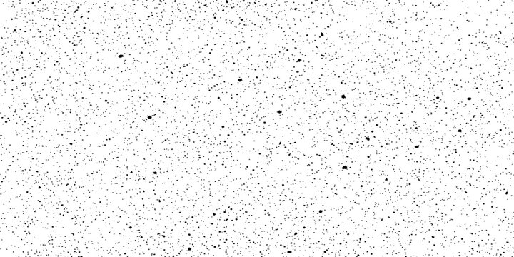 Tiny scattered specks against a textured backdrop, evoking a sense of subtle visual interest and depth.