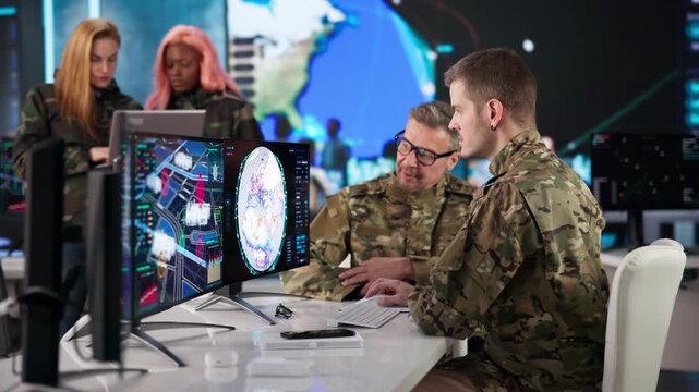Military Intelligence Officer Carefully Monitors Data