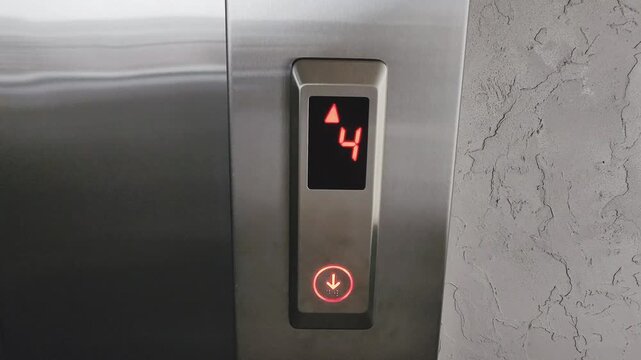 Elevator digital display showing floors going up