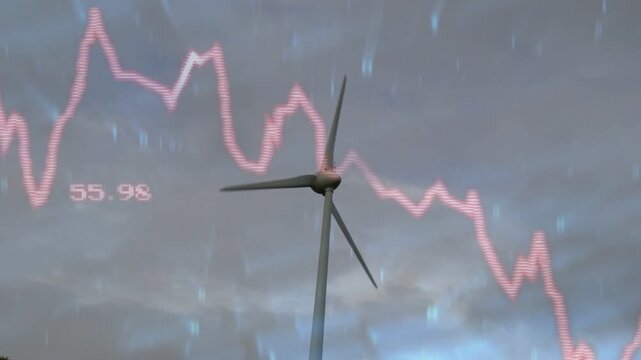 Rotating wind turbine in low cloudy sky showing pink line graph, numeric labels and faint streaks