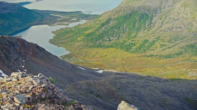 Middagsfjellet, Sandland, Nordkapp, Finnmark, Norway - The View From the Mountain Shows a Valley, Winding Rivers, and a Serene Lake Surrounded by Peaks - Handheld Shot