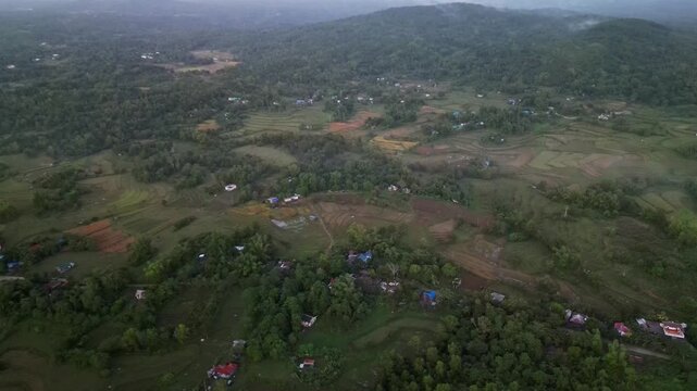 Scenic aerial view of agricultural patchwork farmland and scattered village settlements - Guimaras Island, Visayas, Philippines