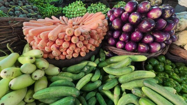 Fresh vegetables displayed at an outdoor market stall