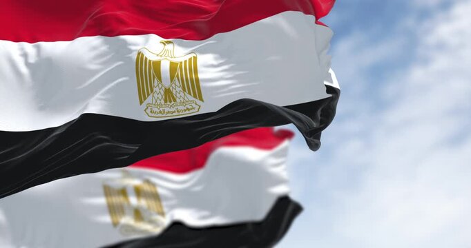National flags of Egypt waving on a clear day. Seamless 3d render animation. Slow motion loop. Selective focus Close-up. Selective focus