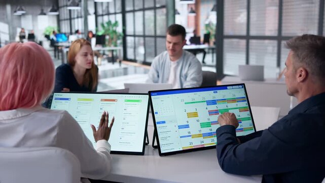Project Manager Leading Team Discussion Using Kanban