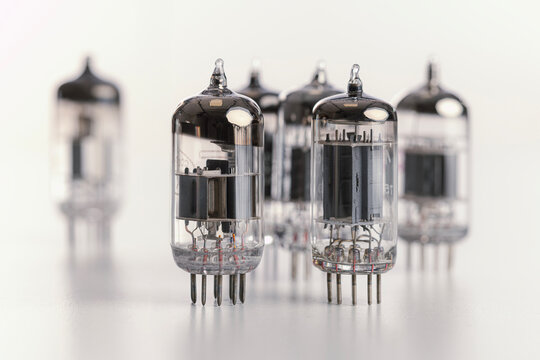 Vacuum tubes standing on white background