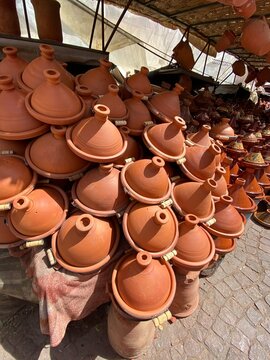 Clay tagines in the souk for sale in Marrakech, Morocco.