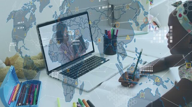 Girl writing watching laptop teacher showing book, global map overlay growing on desk for learning