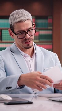 Attorney Carefully Reading Troubling Letter About Client's Legal Case