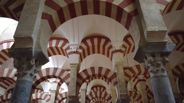 Corinthian capitals and arches in Cordoba mosque interior historic architecture Spain