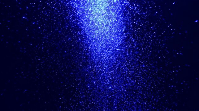 Glittering particles falling slow motion loopable christmas glamour abstract blue background sparkle festive shimmer light luxury celebration decorative magical motion elegant
