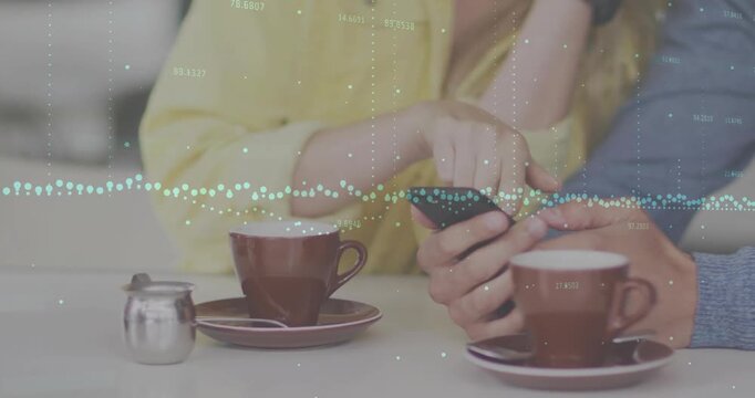 Animation of diagrams and data processing over caucasian couple using smartphone