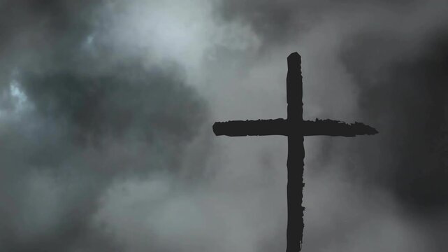 Silhouette of cross against dramatic cloudy sky with animation effect