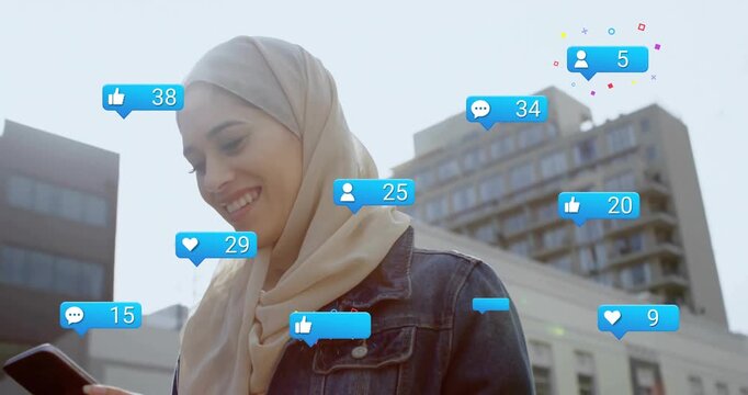 Using smartphone, woman receiving social media notifications with animation overlay