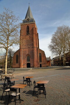 The Petruskerk church and Kerkplein square with historic houses in Woerden, Utrecht, Netherlands