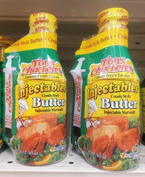 Delaware, U.S.A - March 31, 2026 - Tony Chachere's Injectable Creole-style butter injectable marinade packages showing chef illustration and no‑MSG formulation.