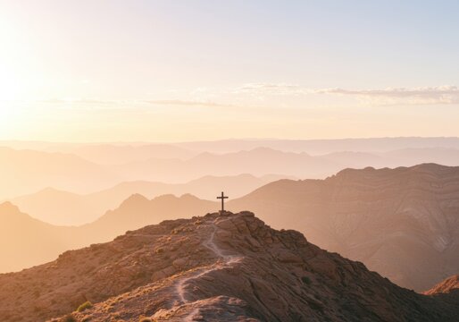 Small Christian Cross Silhouette on a Rock Mountain Peak at Sunset for Church Banner or Inspirational Faith Based Website Header Background with Copy Space