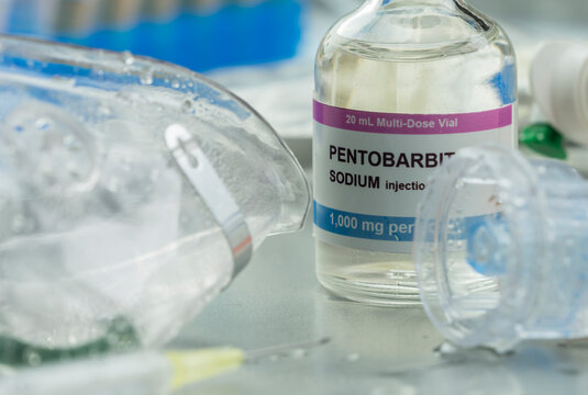 Medication used without success with Redemsivir antiviral drug in patient infected by sars-Cov-2, Vial with sodium pentobarbital, conceptual idea