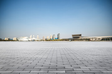 Obraz premium Expansive Urban Landscape Showcasing Modern Architecture Under a Clear Sky