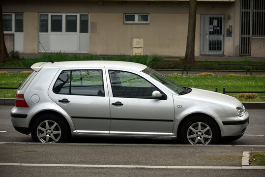 Mulhouse - France - 10 April 2026 - profile view of grey volkswagen golf  4 parked in the street