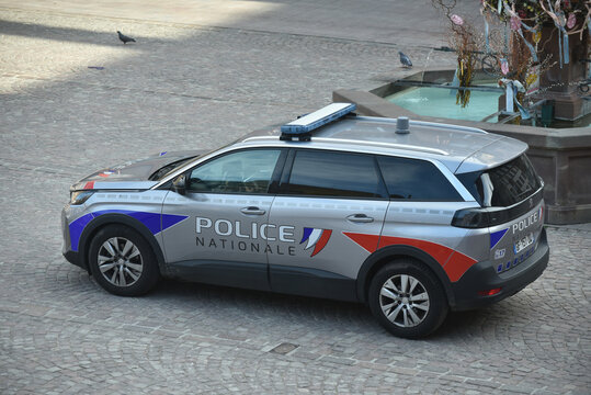 Mulhouse - France - 10 April 2026 - profile view of grey police car parked in the street