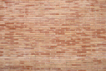 Fototapeta premium Mur de briques de couleur rouge, rose, orange